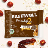 Hafervoll Porridge2go Unt de alune și nuci, 13 batoane x 55g - Vegan, Organic, Fără gluten, Gustare fără zahăr adăugat, cu ovăz, curmale și bomboane de quinoa