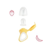Hrănitoare pentru bebeluși Badabulle cu capac protector, mâner ergonomic, calmează gingiile și introduce arome noi, de la 4 luni, fără BPA