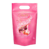 Bile de ciocolată extra neagră Lindt LINDOR și biluțe de ciocolată cu cremă de căpșuni LINDOR | pungă resigilabilă de 1 kg | aprox. 80 de biluțe de ciocolată albă cu cremă de căpșuni