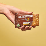 Hafervoll Porridge2go Unt de alune și nuci, 13 batoane x 55g - Vegan, Organic, Fără gluten, Gustare fără zahăr adăugat, cu ovăz, curmale și bomboane de quinoa