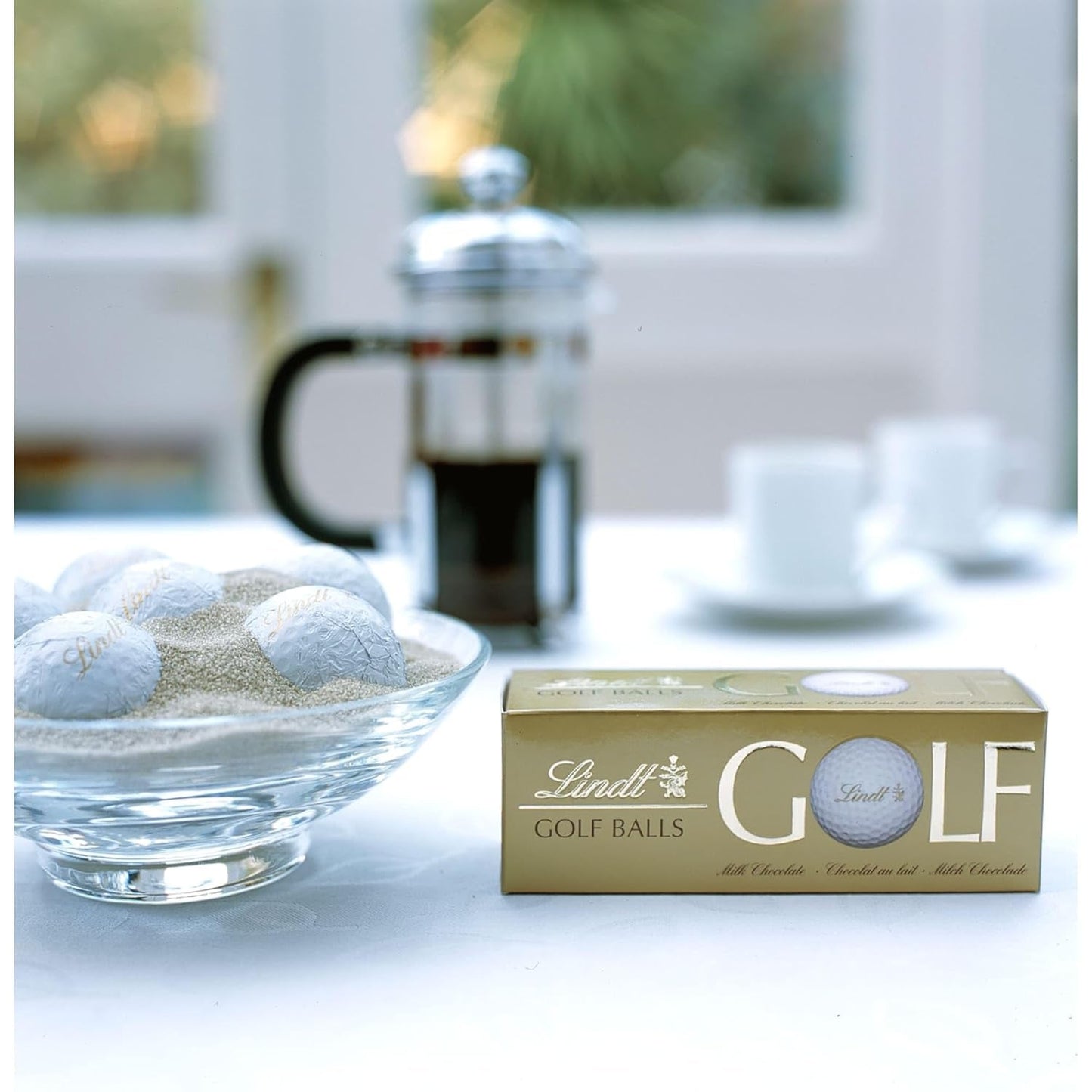 Lindt Schokolade - Golfbälle | 110 G | Drei Golfbälle Aus Lindt Vollmilch-Schokolade Mit Nougatcremefüllung Und Waffelstückchen | Pralinengeschenk | Geschenk Für Golfer | Schokoladengeschenk Naty Shop