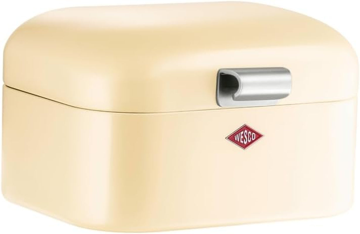 Coș pentru pâine Wesco Mini Grandy în culoarea roz, tablă de oțel acoperită cu pulbere, găuri de ventilație și mâner robust Cutii depozitare alimente Naty Shop Migdale