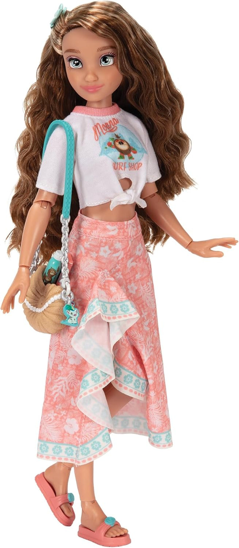 Păpușă Vaiana cu accesorii, 29 cm, 13 puncte de articulație, licențiată oficial de Jakks Pacific. Completă cu accesorii combinabile și un inel strălucitor cu Mickey!