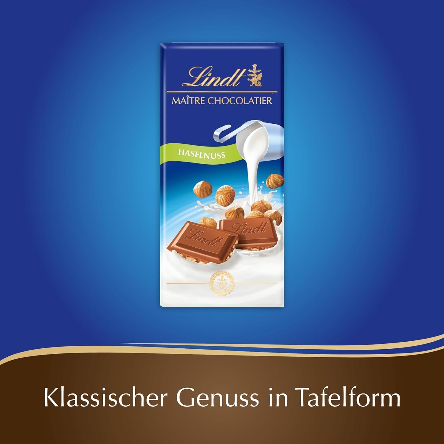 Lindt Ciocolată | Baton cu ciocolată cu lapte și alune | 100g | Ciocolată cu lapte fină, topită, cu bucăți crocante de alune | Baton de ciocolată