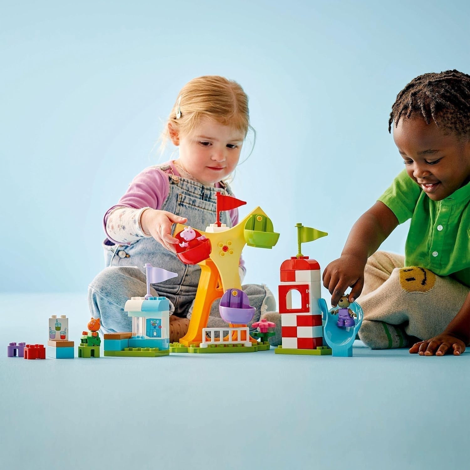 LEGO DUPLO Peppa Wutz Fairground - Jucării pentru copii și jucării pentru abilități motorii pentru vârsta de 2+ - Jocuri preșcolare cu roată mare, tobogan și 3 figuri, inclusiv Mollie Kitty și Klausi Kläff - Cadou pentru copii 10453 Seturi de constructie Besuche den LEGO-Store