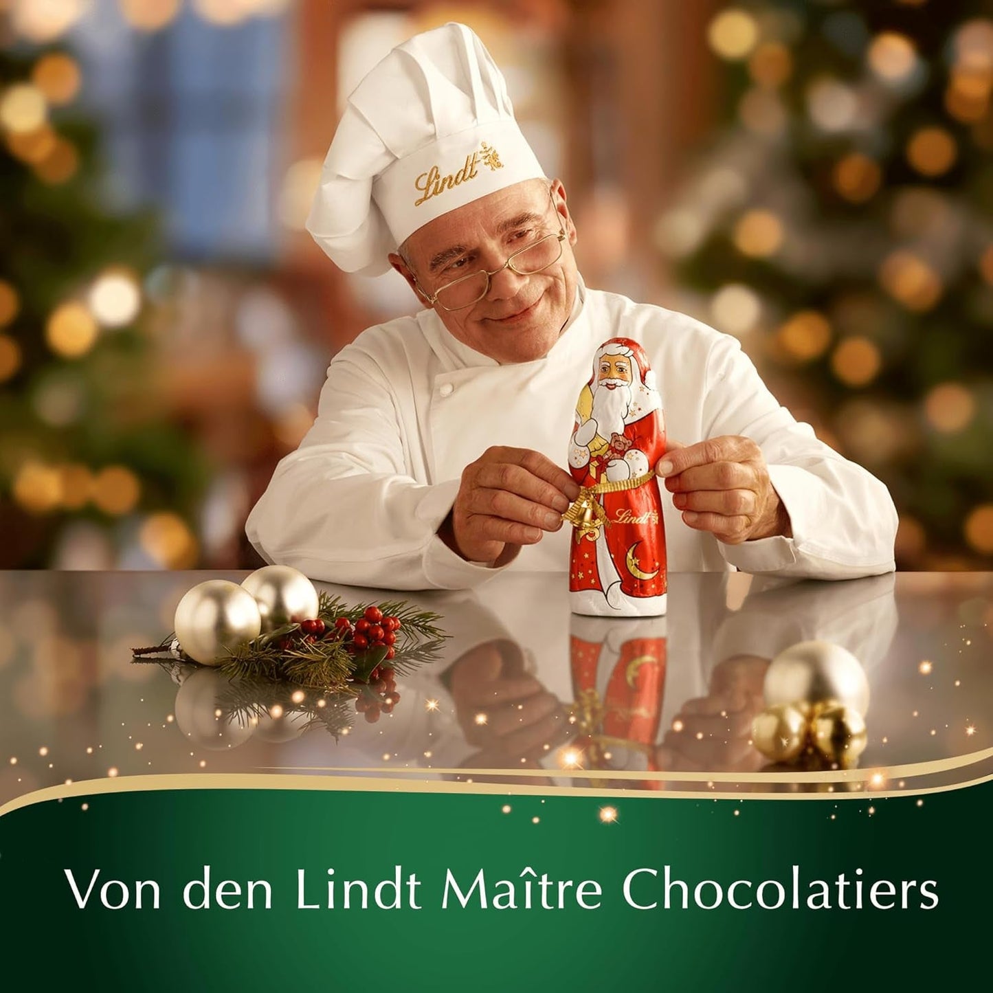 Baton de ciocolată Lindt cu migdale de Crăciun | 100 g | Migdale în cremă de nuci acoperite cu cea mai fină ciocolată cu lapte | Cadou de ciocolată de Crăciun