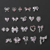Luxus Rosa Diamant Nagel Charms 3D Butterfly Nail Art Charms Bow Nail Charms Y2K Heart Charms Nägel Zubehör Schmetterling Herz Schleife Nageldesign Edelsteine Strasssteine Glitzersteine Nagelschmuck