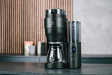 Melitta AromaFresh X – Espressor cu filtru, cu râșniță integrată, carafă de sticlă și funcție de temporizator, pentru până la 10 cești de cafea, negru/argintiu