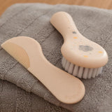 Suavinex 3162385 Pieptene cu perie, alb Copii - Baie si Skincare Naty Shop